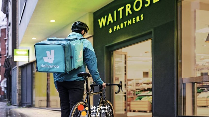Photo of a deliveroo cyclist outside Waitrose