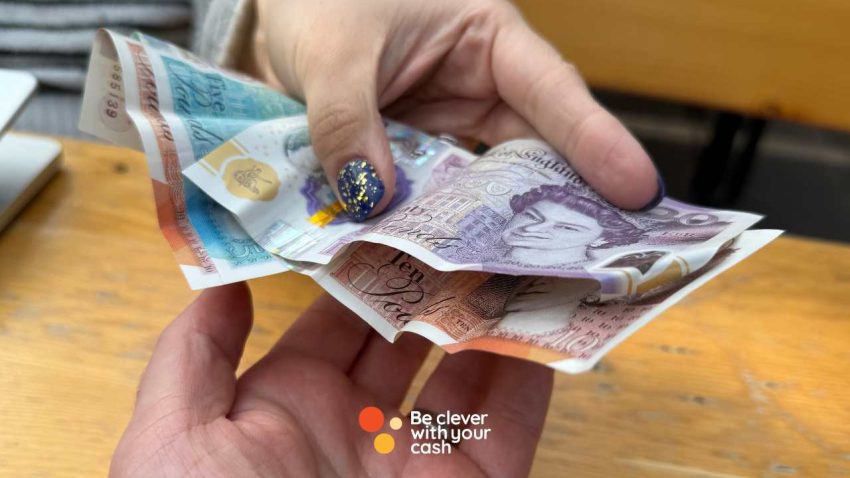 Business savings accounts explained cash being passed over